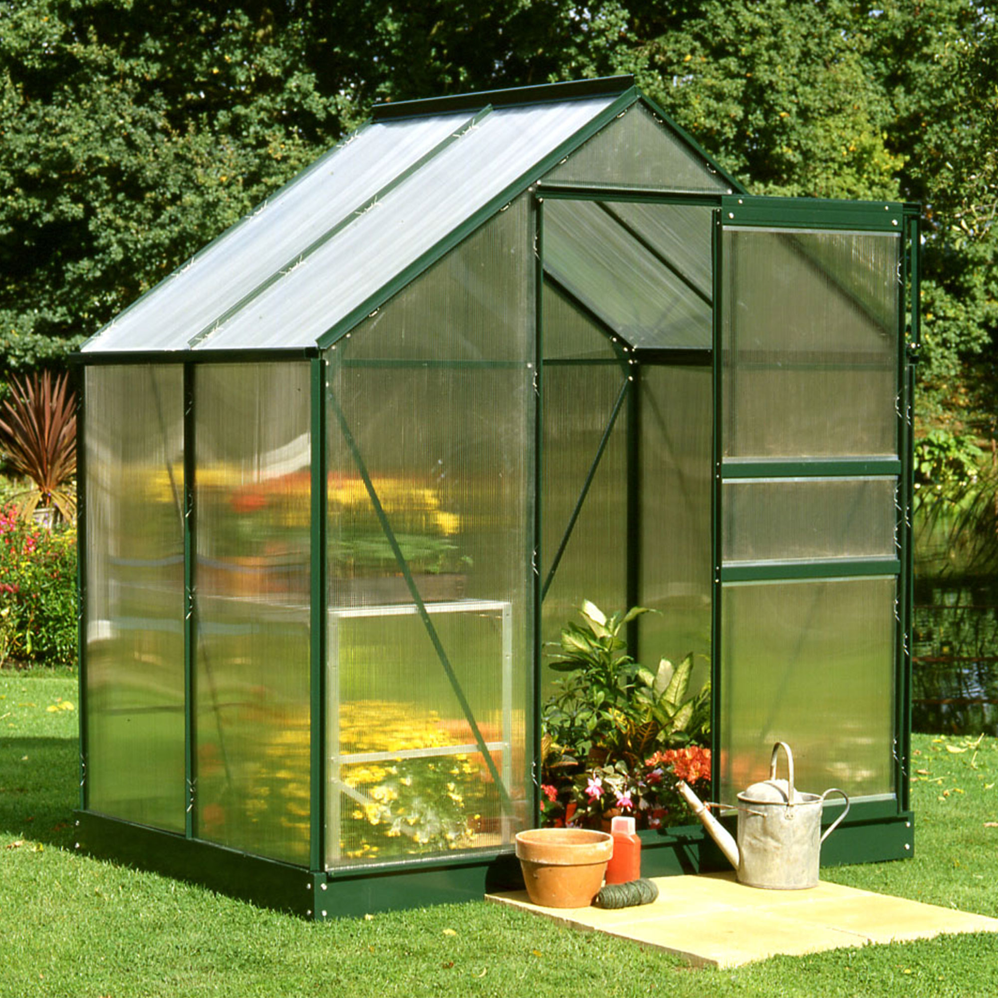 Product photograph of 6 X4 Halls Green Frame Polycarbonate Greenhouse 1 92x1 32m from Buy Sheds Direct