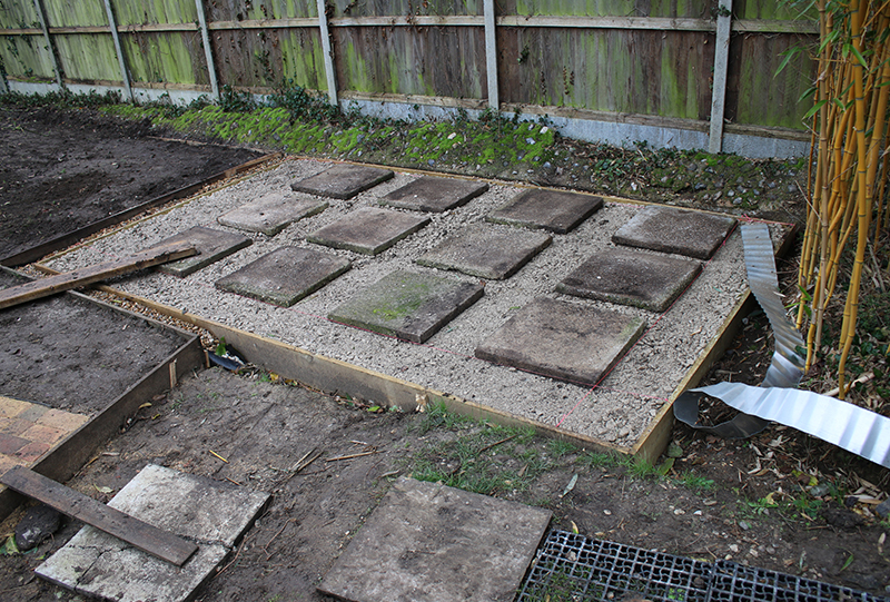 a level shed base made of concrete blocks with gaps in between